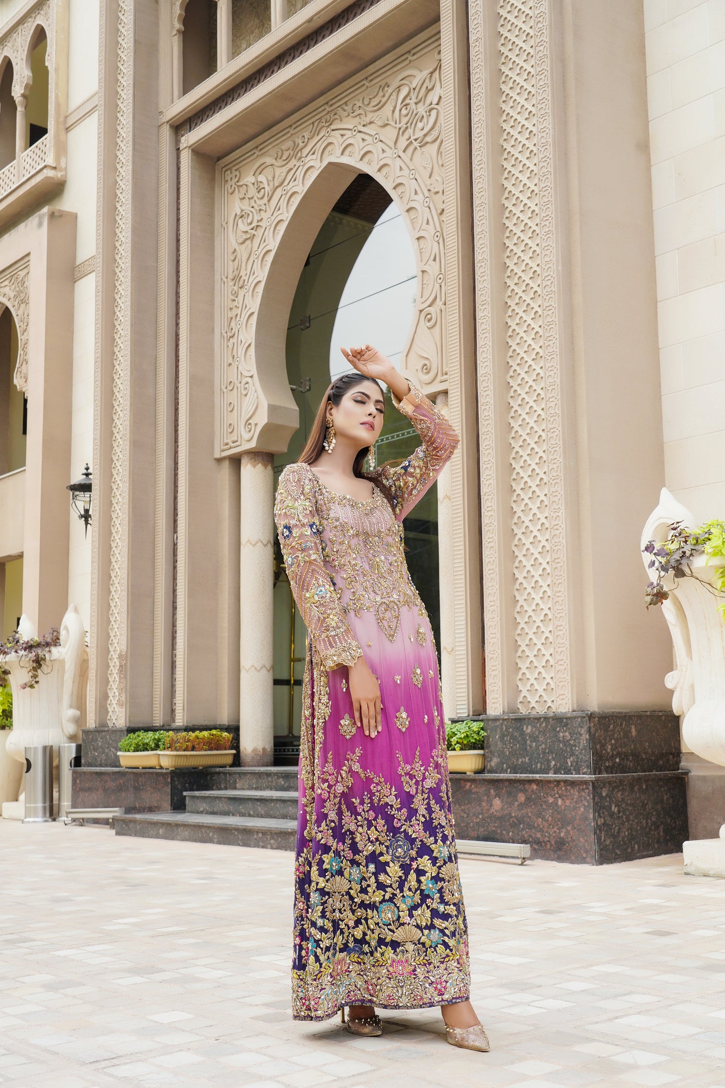 Purple and lacy lilac ombre Pakistani formal dress with dupatta: A stunning dress featuring a blend of purple and lacy lilac colors with intricate embroidery and beadwork on the bodice. The A-line silhouette is made with high-quality, comfortable fabric. The matching dupatta is sheer and lightweight