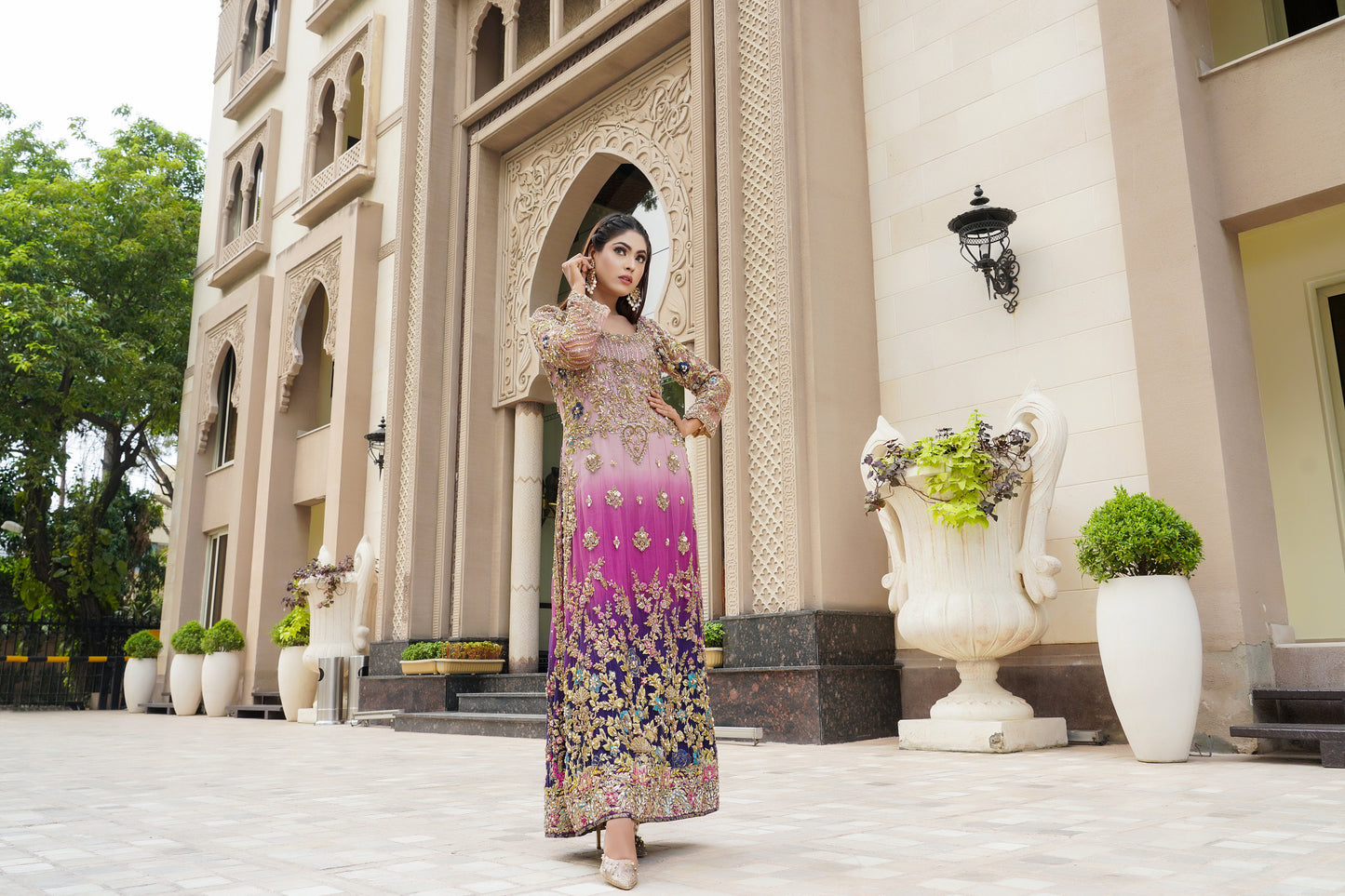 Purple and lacy lilac ombre Pakistani formal dress with dupatta: A stunning dress featuring a blend of purple and lacy lilac colors with intricate embroidery and beadwork on the bodice. The A-line silhouette is made with high-quality, comfortable fabric. The matching dupatta is sheer and lightweight
