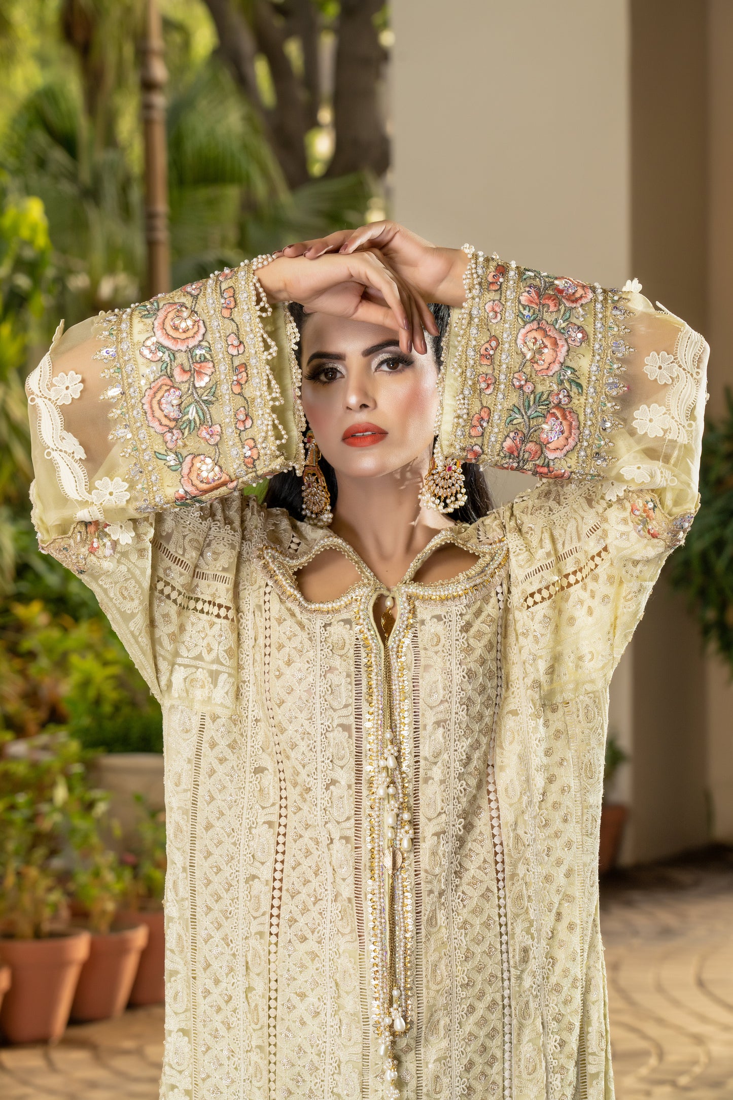Yellow lime luxury Pret Pakistani dress with fitted bodice, voluminous skirt, and short sleeves. Paired with a printed designed dupatta featuring prints in shades of yellow and lime with a matching border. Perfect for formal events and designed with high-quality fabric and intricate details for both beauty and comfort.