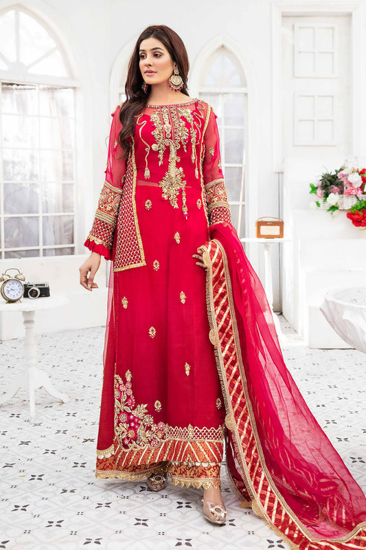 A beautiful Pakistani formal dress in shades of maroon and pink, with intricate gold work adorning the bodice, sleeves, and hemline. The dress features a flattering silhouette and is perfect for formal occasions.