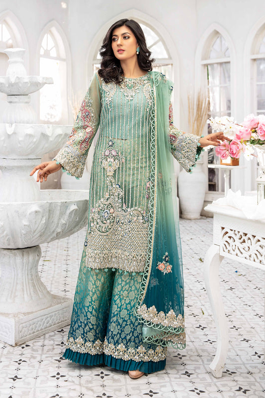 A beautiful turquoise blue double shaded Pakistani formal dress with intricate silver work on the bodice and sleeves. The dress features a lovely dupatta that complements the elegant design. Perfect for formal events and special occasions, this dress showcases traditional Pakistani style with its mesmerizing beauty and charm.