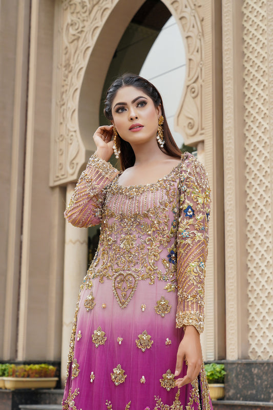 Purple and lacy lilac ombre Pakistani formal dress with dupatta: A stunning dress featuring a blend of purple and lacy lilac colors with intricate embroidery and beadwork on the bodice. The A-line silhouette is made with high-quality, comfortable fabric. The matching dupatta is sheer and lightweight