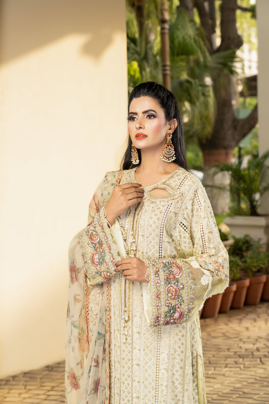 Yellow lime luxury Pret Pakistani dress with fitted bodice, voluminous skirt, and short sleeves. Paired with a printed designed dupatta featuring prints in shades of yellow and lime with a matching border. Perfect for formal events and designed with high-quality fabric and intricate details for both beauty and comfort.