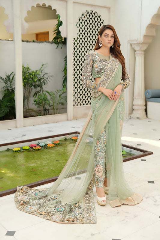 Pistachio green Pakistani formal dress with dupatta: A beautiful, embroidered dress in a light green color. The dress has an A-line silhouette and is made with high-quality, comfortable fabric. The matching dupatta is sheer and lightweight, featuring embroidery and embellishments that complement the dress. Perfect for special occasions such as weddings or formal dinners.